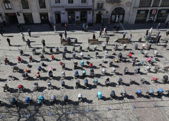 Empty baby strollers in Lviv central square. Ukraine commemorates children killed by russians 1