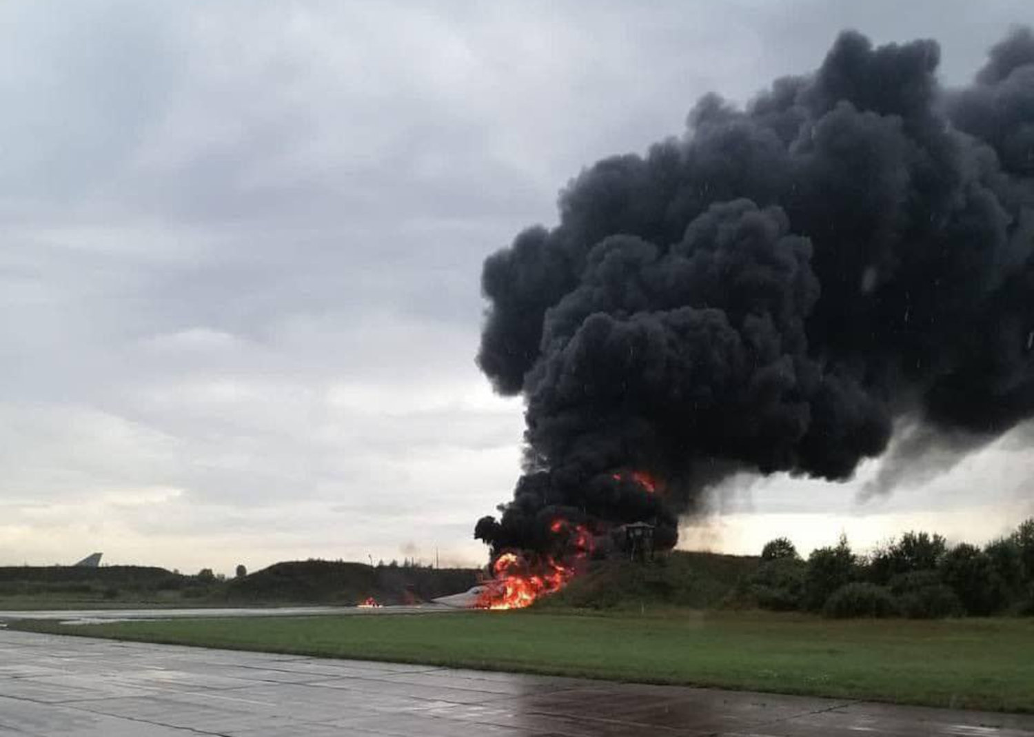 russian social media published photo of Tu-22M3 bomber engulfed in fire at russian air base Soltsy