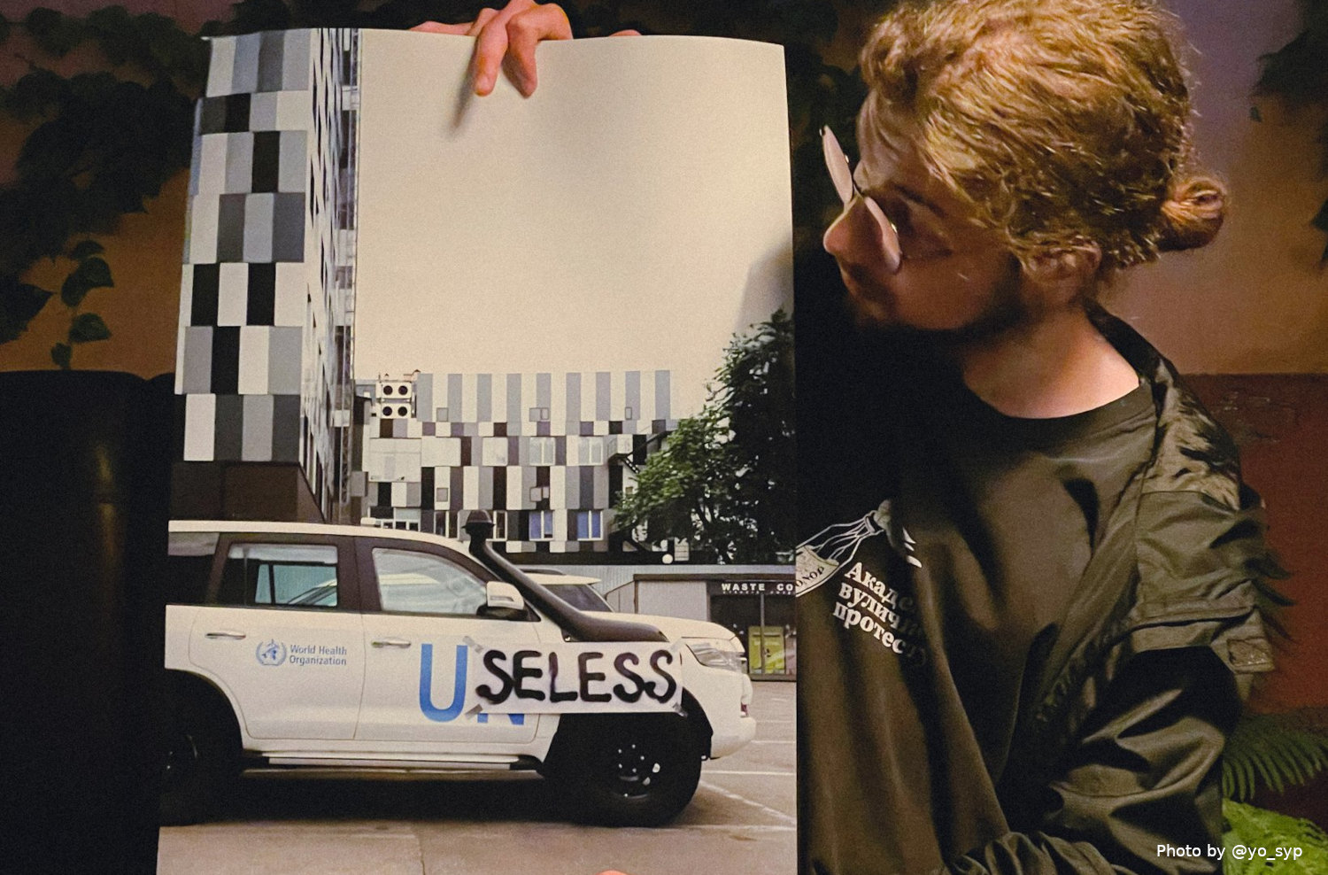 UN to sue activist who placed "Useless" sign on organization's cars